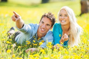 Cheerful couple enjoying in the nature.